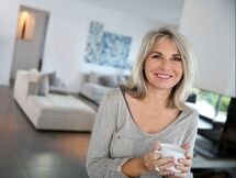 Woman Smiling With Coffee